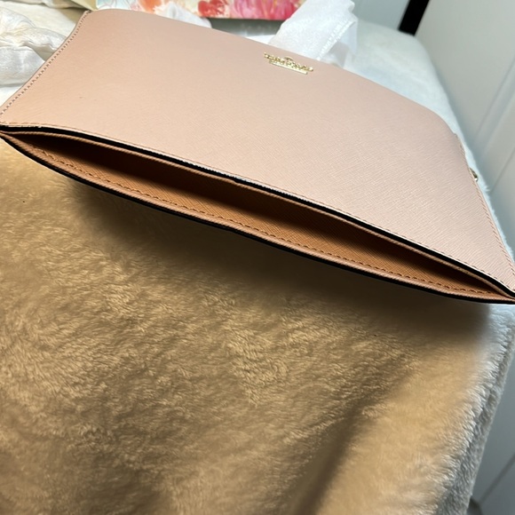 Kate Spade Bag gold name on outside of bag, pink leather, gray and white lining - Picture 5 of 9